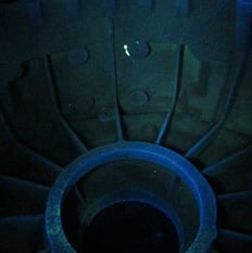 Sample photos of indications obtained using a fluorescent penetrant. Sample photos of indications obtained using a fluorescent penetrant.